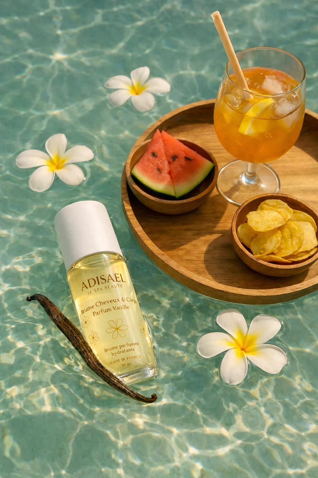 Brume cheveux et corps parfum vanille, fleurs de frangipanier, collation et boisson sur eau